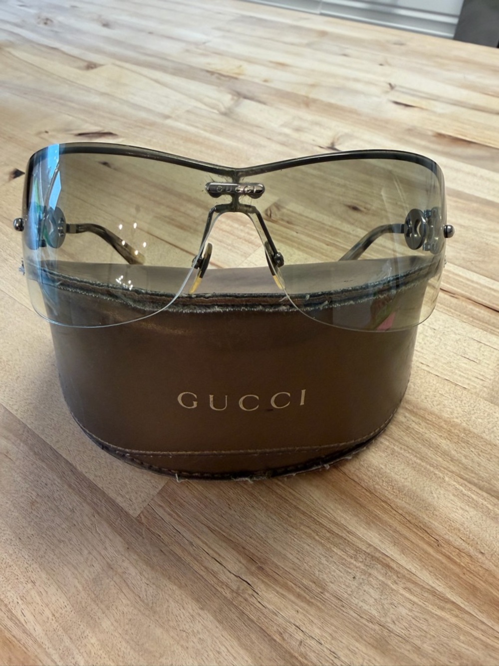 Gucci Rimless Shield Sunglasses — Smoke Gradient Lenses